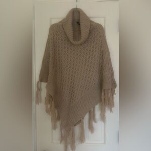 Sweater Poncho with tassels
